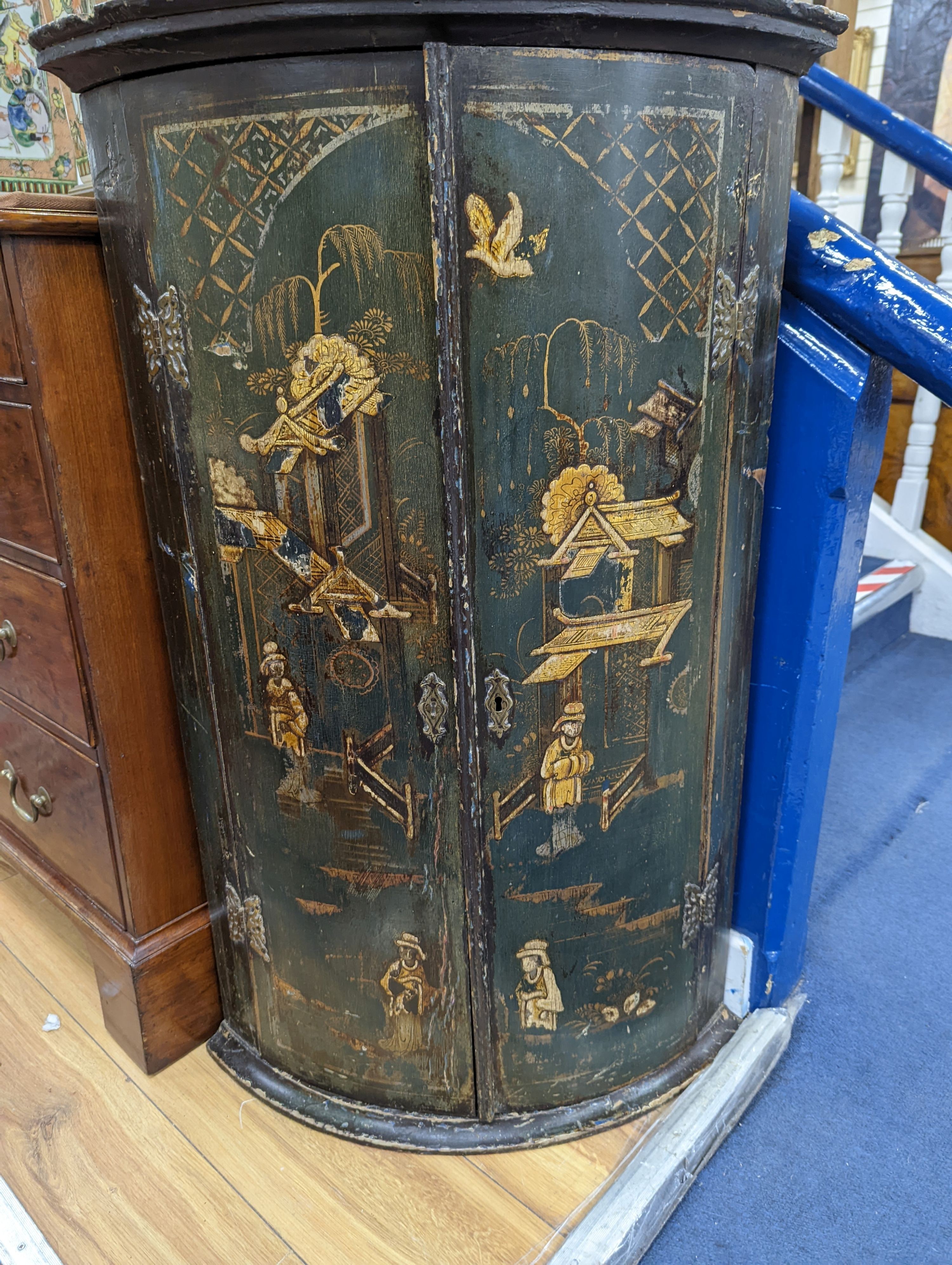 An 18th century Japanned lacquer bow front hanging corner cabinet, width 58cm, depth 39cm, height 92cm